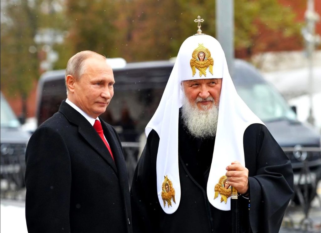Criminalul de război, Vladimir Putin și Patriarhul Moscovei, ereticul Kiril - cei doi beneficiari ai scandalului homosexual din Mitropolia Basarabiei. FOTO: Facebook