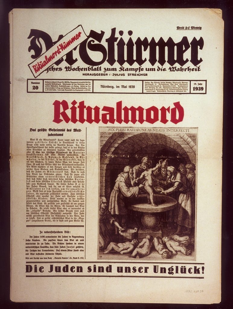 Un număr al revistei antisemite naziste „Der Stürmer” care promovează un narativ al propagandei naziste despre „uciderea ritualică a copiilor de către evrei”. FOTO: Holocaust Encyclopedia